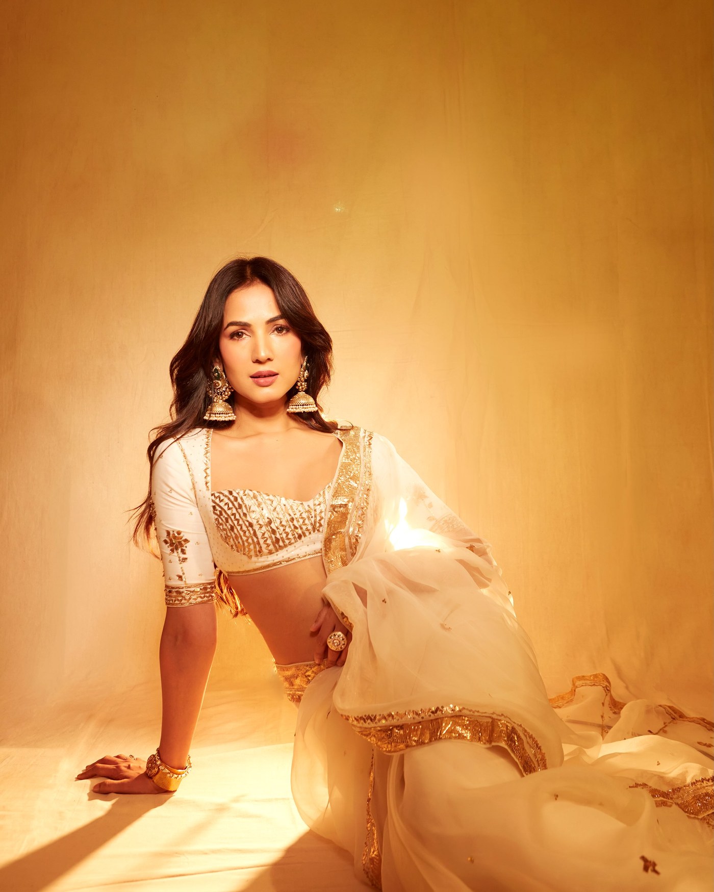 Sonal Chauhan Radiates Grace in Cream and Gold Indian Couture