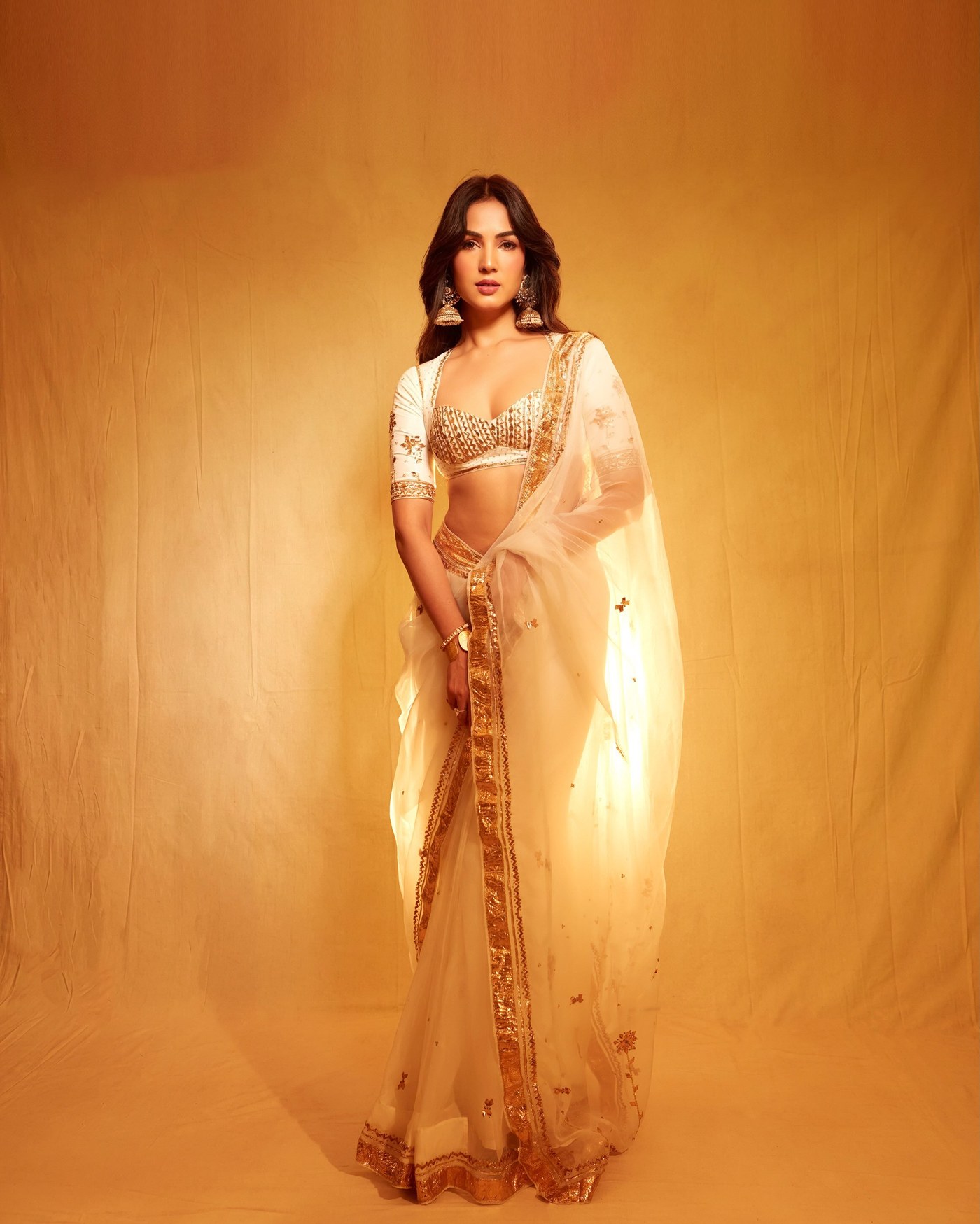 Sonal Chauhan Radiates Grace in Cream and Gold Indian Couture