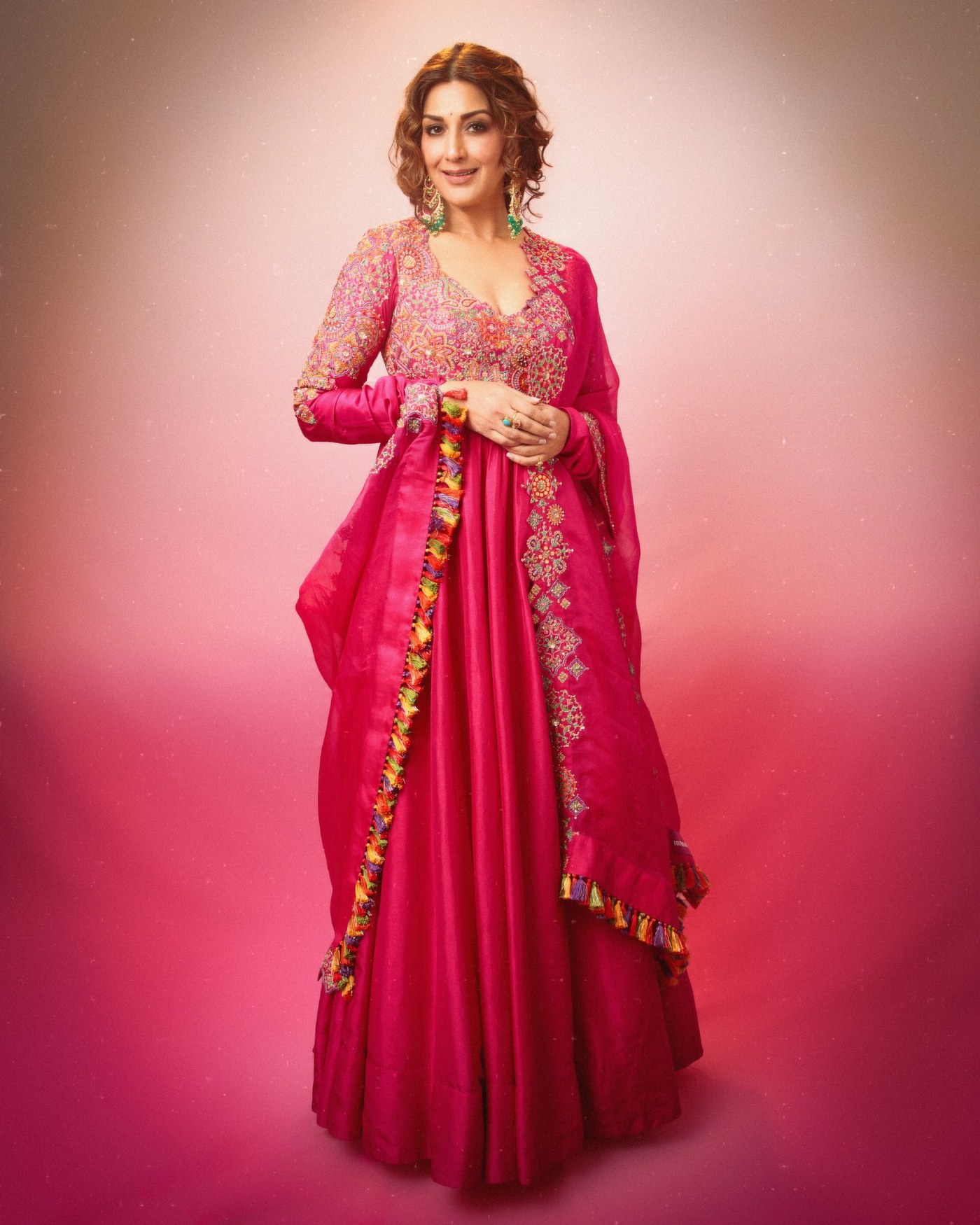 Sonali Bendre in a vivid fuchsia ensemble with rich embroidery details. - Photos & Updates