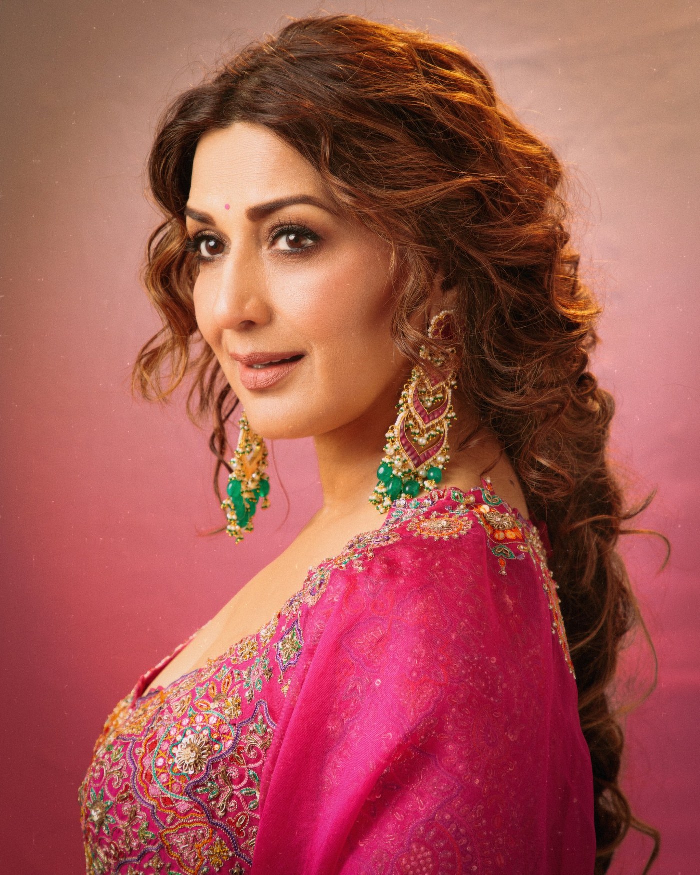 Fuchsia Fabrication: Sonali Bendre's Vibrant Festive Styling