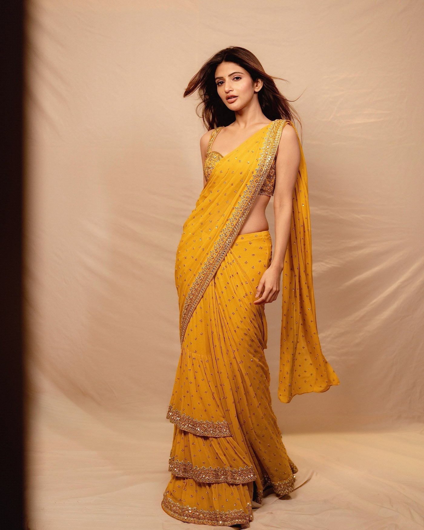Marigold Hue: Sreeleela's Sunlit Sari Styling Review