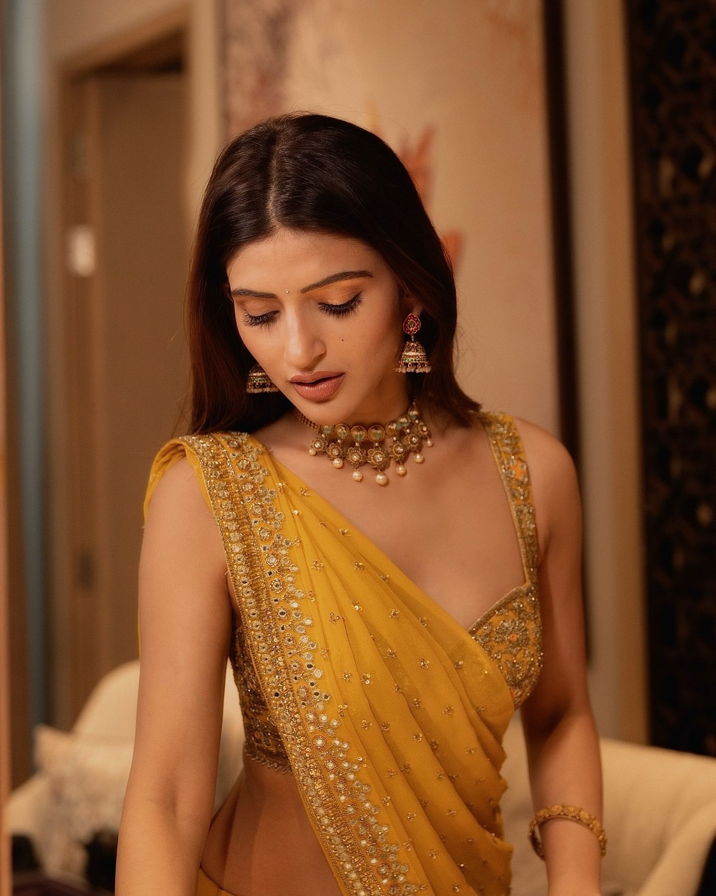 Marigold Hue: Sreeleela's Sunlit Sari Styling Review