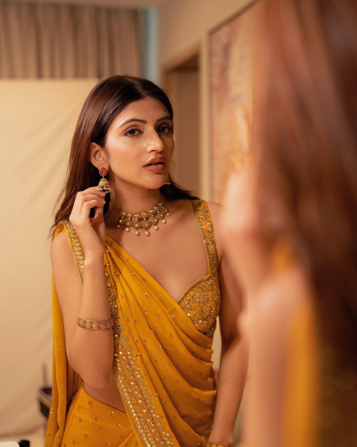 Marigold Hue: Sreeleela's Sunlit Sari Styling Review