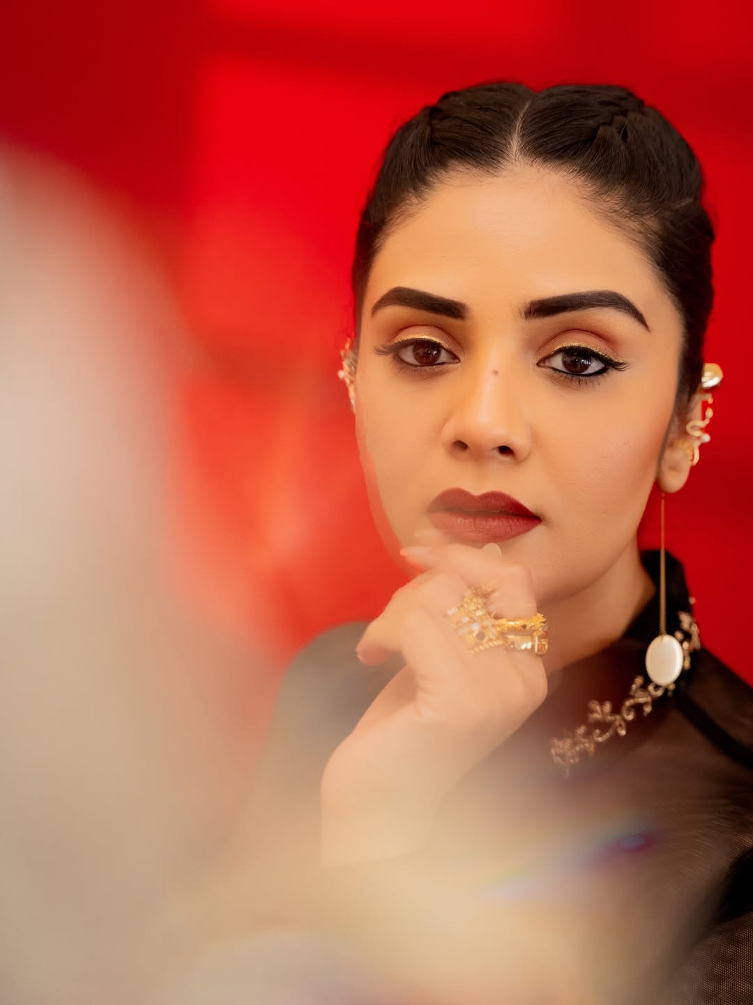 Sreemukhi's Regal Red & Gold Ensemble Captures Attention