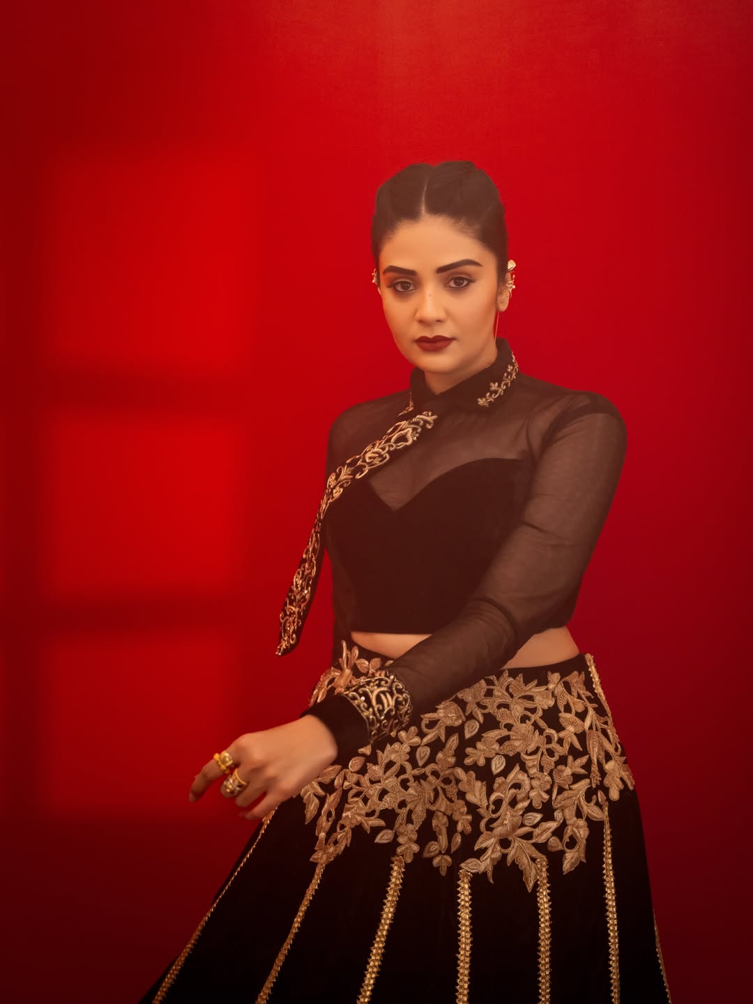 Sreemukhi's Regal Red & Gold Ensemble Captures Attention
