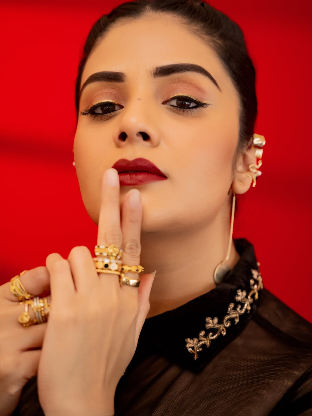 Sreemukhi's Regal Red & Gold Ensemble Captures Attention