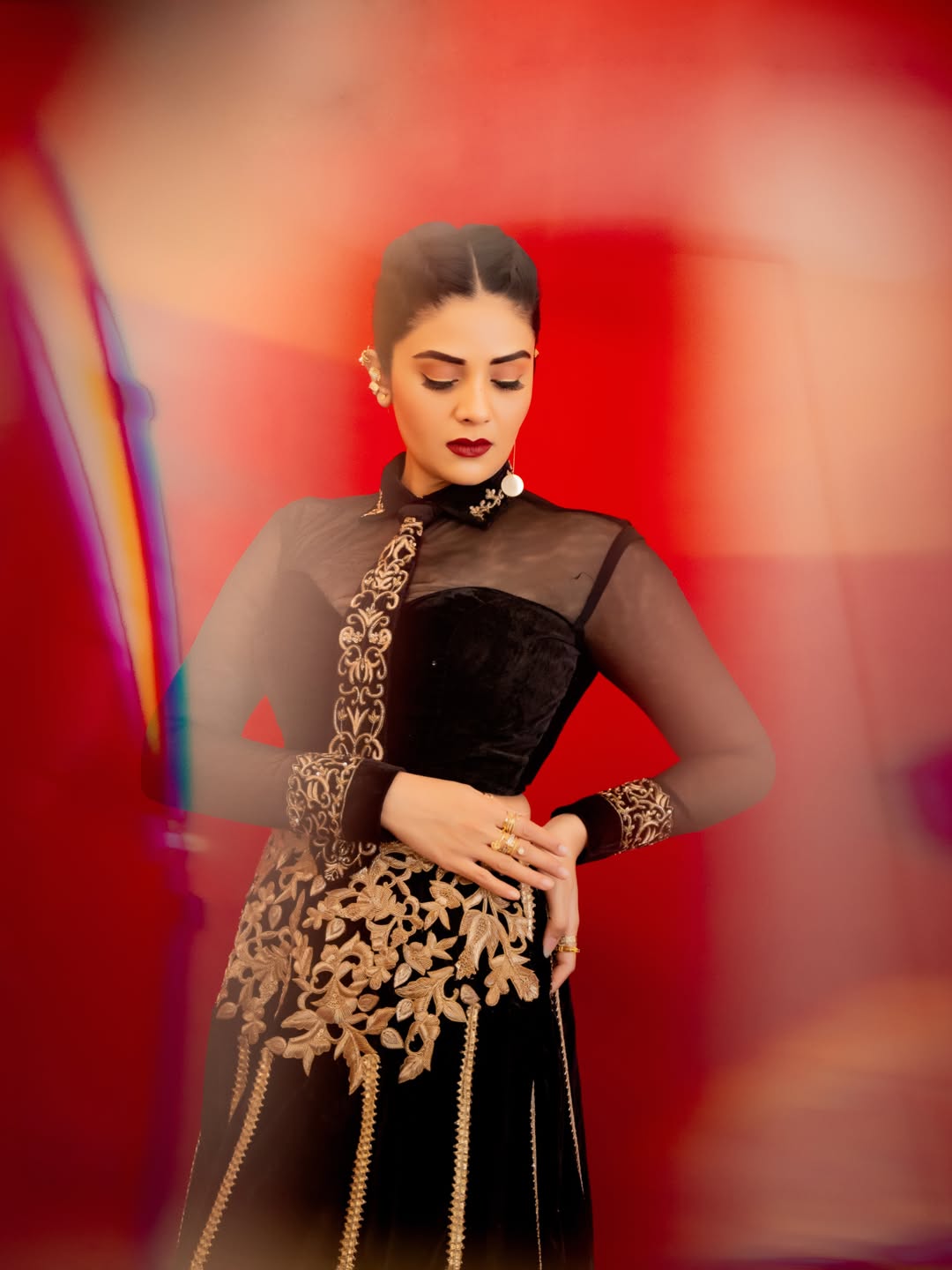 Sreemukhi's Regal Red & Gold Ensemble Captures Attention