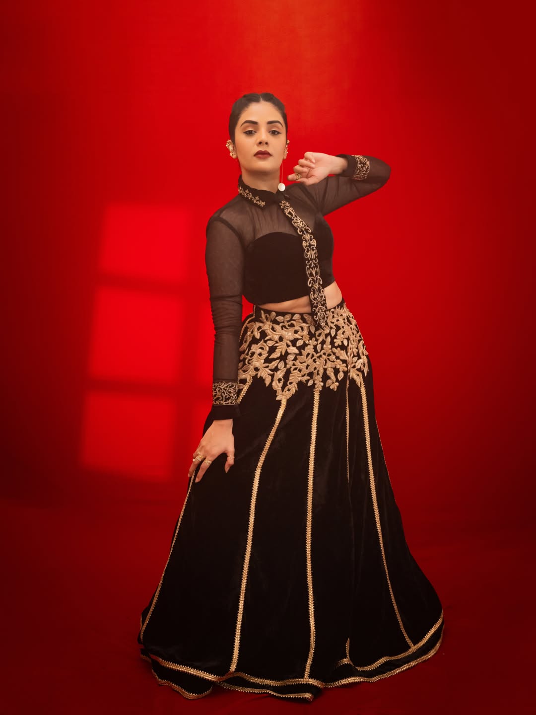 Sreemukhi's Regal Red & Gold Ensemble Captures Attention