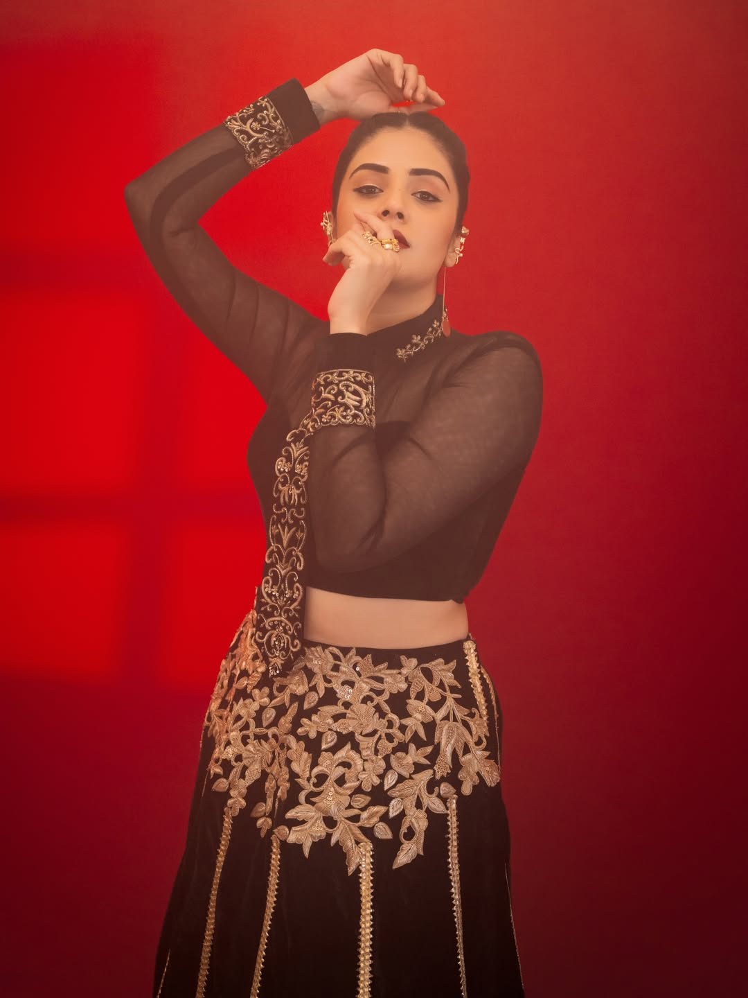 Sreemukhi's Regal Red & Gold Ensemble Captures Attention