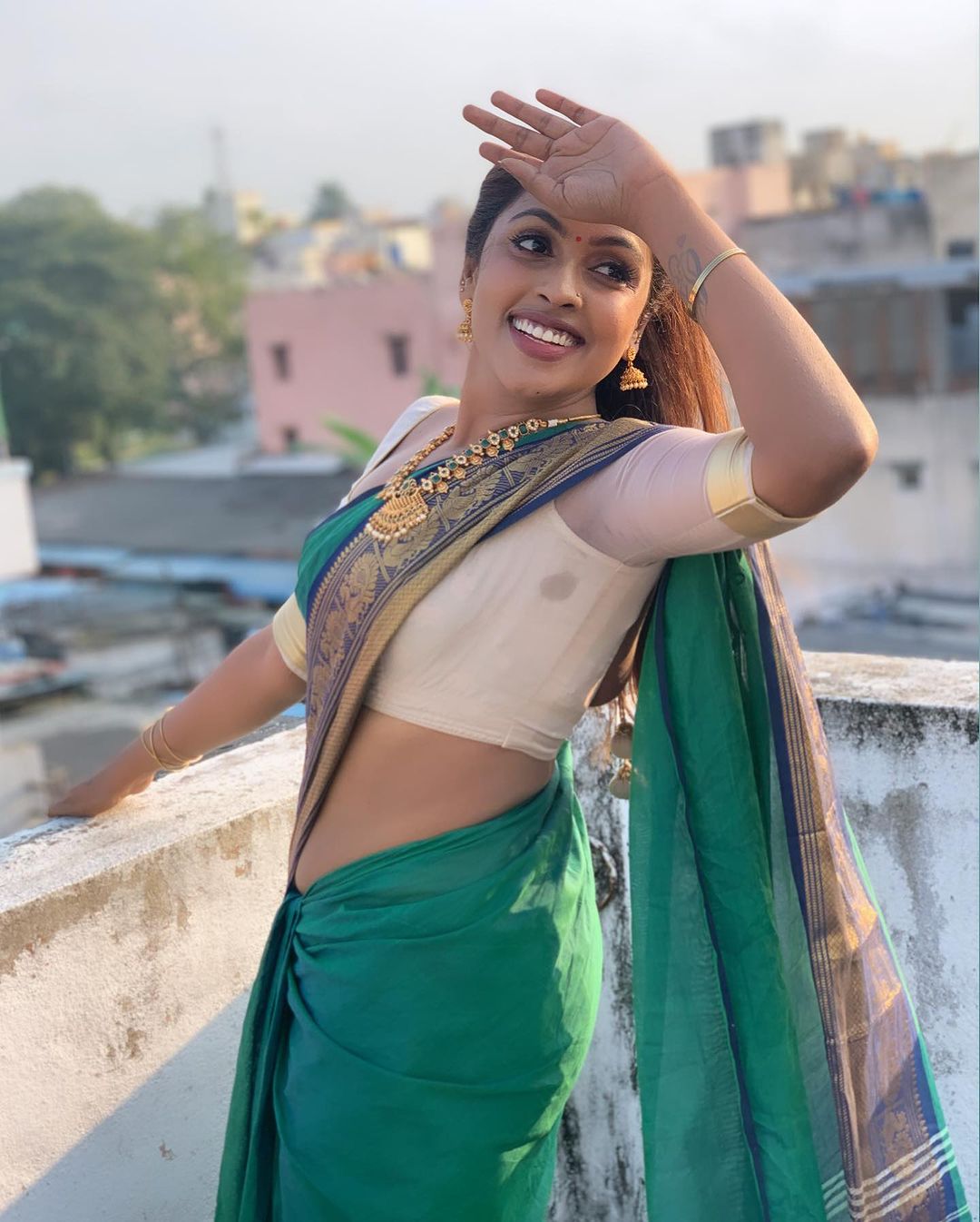 Srinikha's Stunning Green Saree Photos | Timeless Traditional Elegance