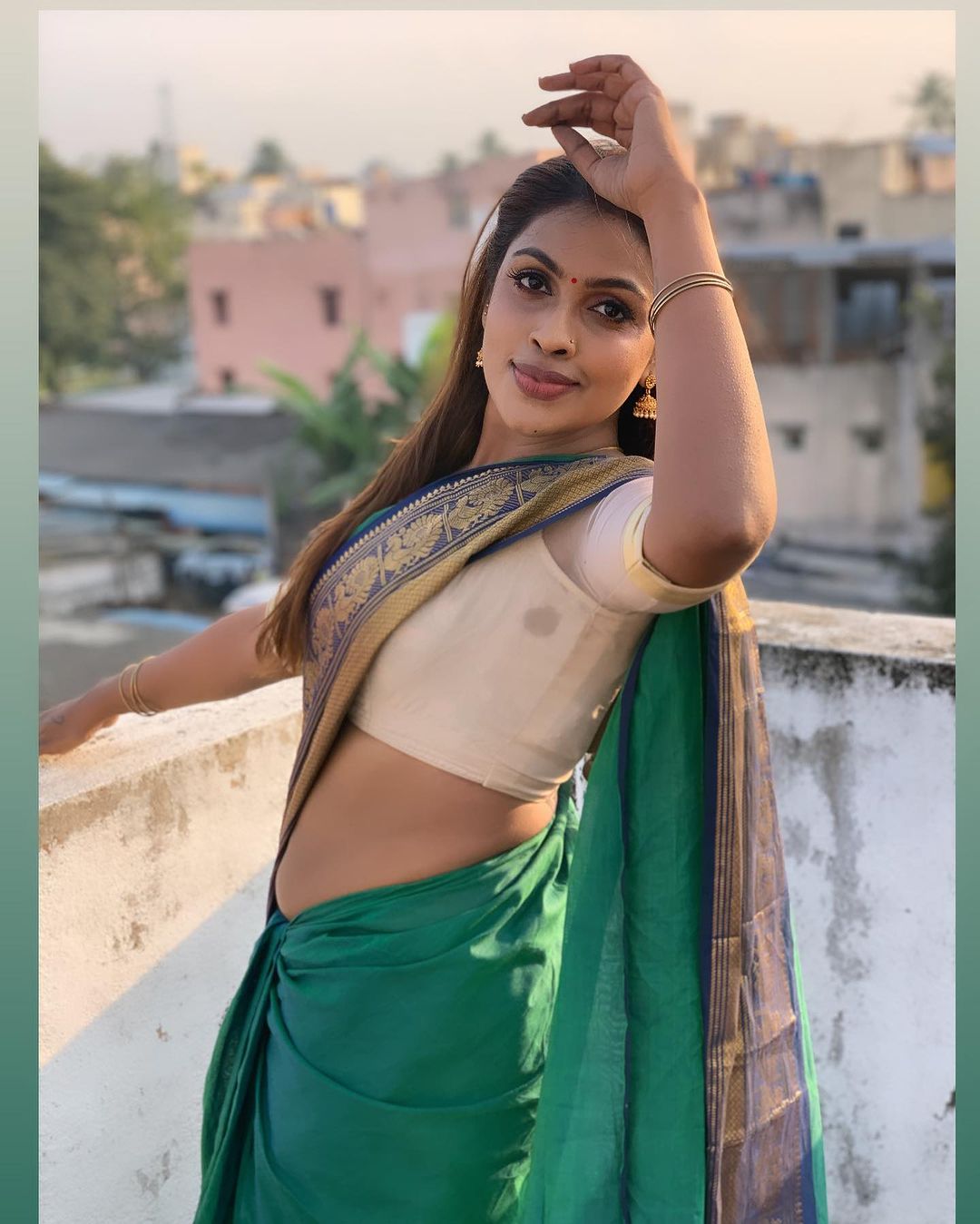 Srinikha's Stunning Green Saree Photos | Timeless Traditional Elegance