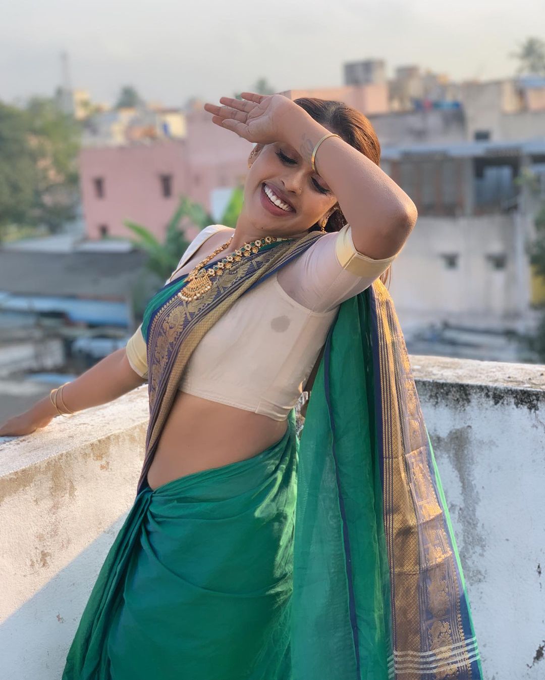 Srinikha's Stunning Green Saree Photos | Timeless Traditional Elegance