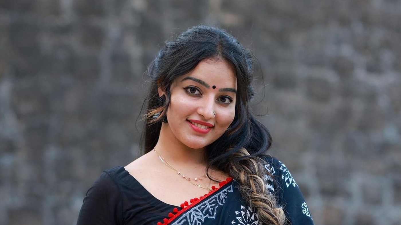 Stunning Malavika Menon in Black Saree Photos Fashion Gallery