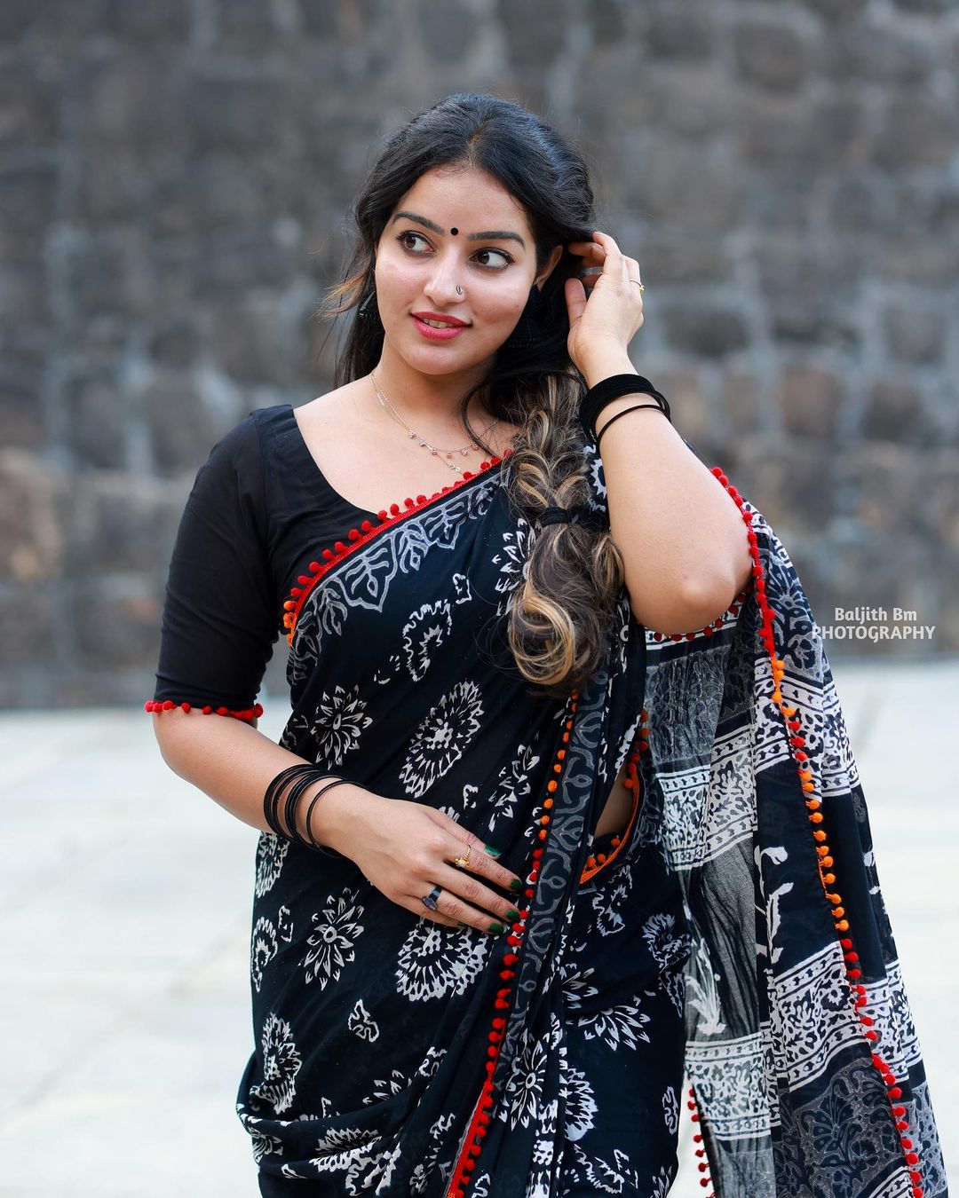 Stunning Malavika Menon in Black Saree Photos Fashion Gallery