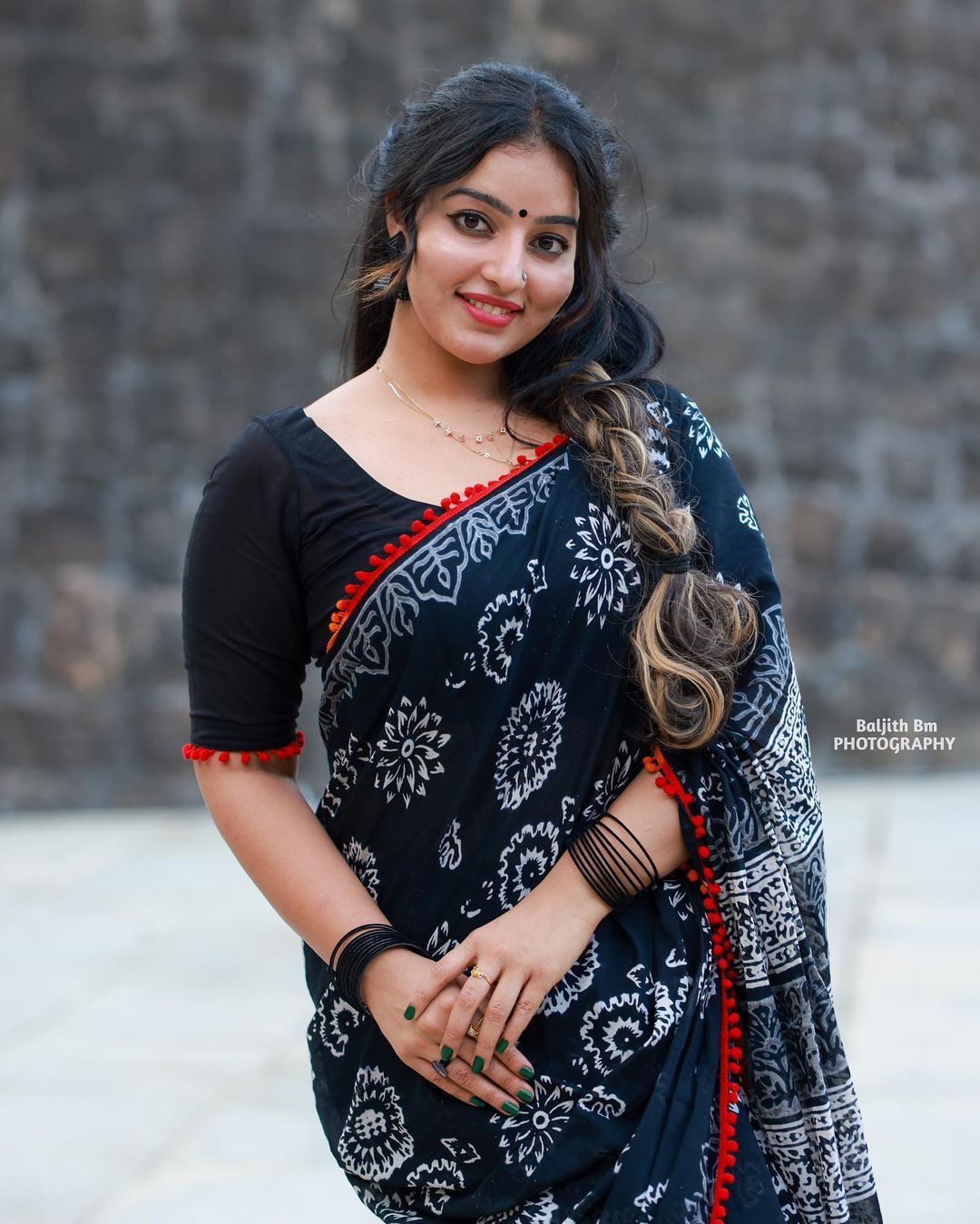 Stunning Malavika Menon in Black Saree Photos Fashion Gallery