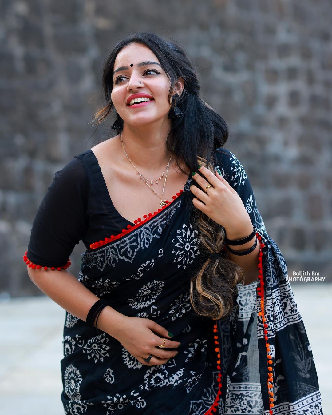 Stunning Malavika Menon in Black Saree Photos Fashion Gallery