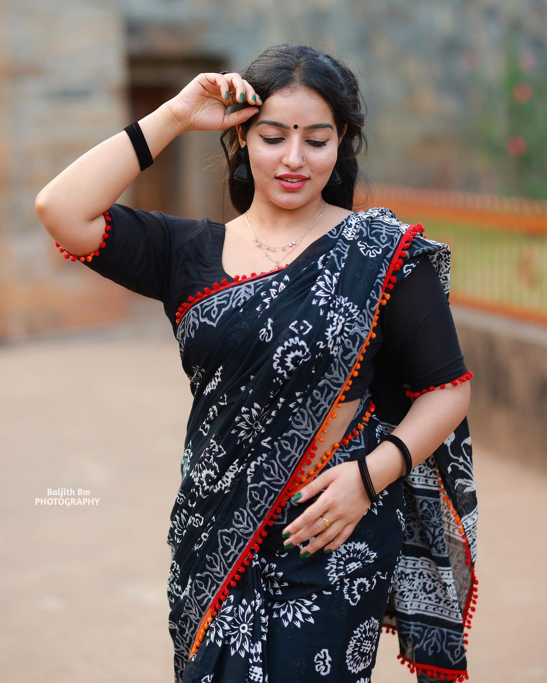 Stunning Malavika Menon in Black Saree Photos Fashion Gallery