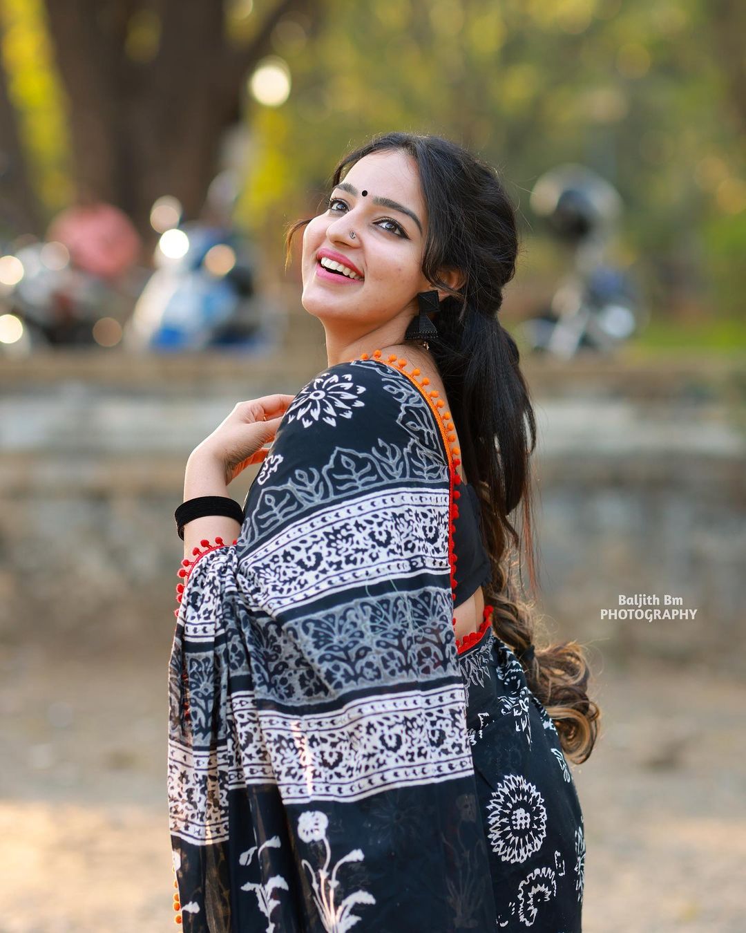 Stunning Malavika Menon in Black Saree Photos Fashion Gallery