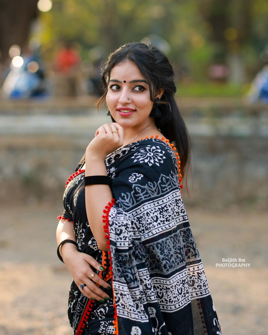 Stunning Malavika Menon in Black Saree Photos Fashion Gallery