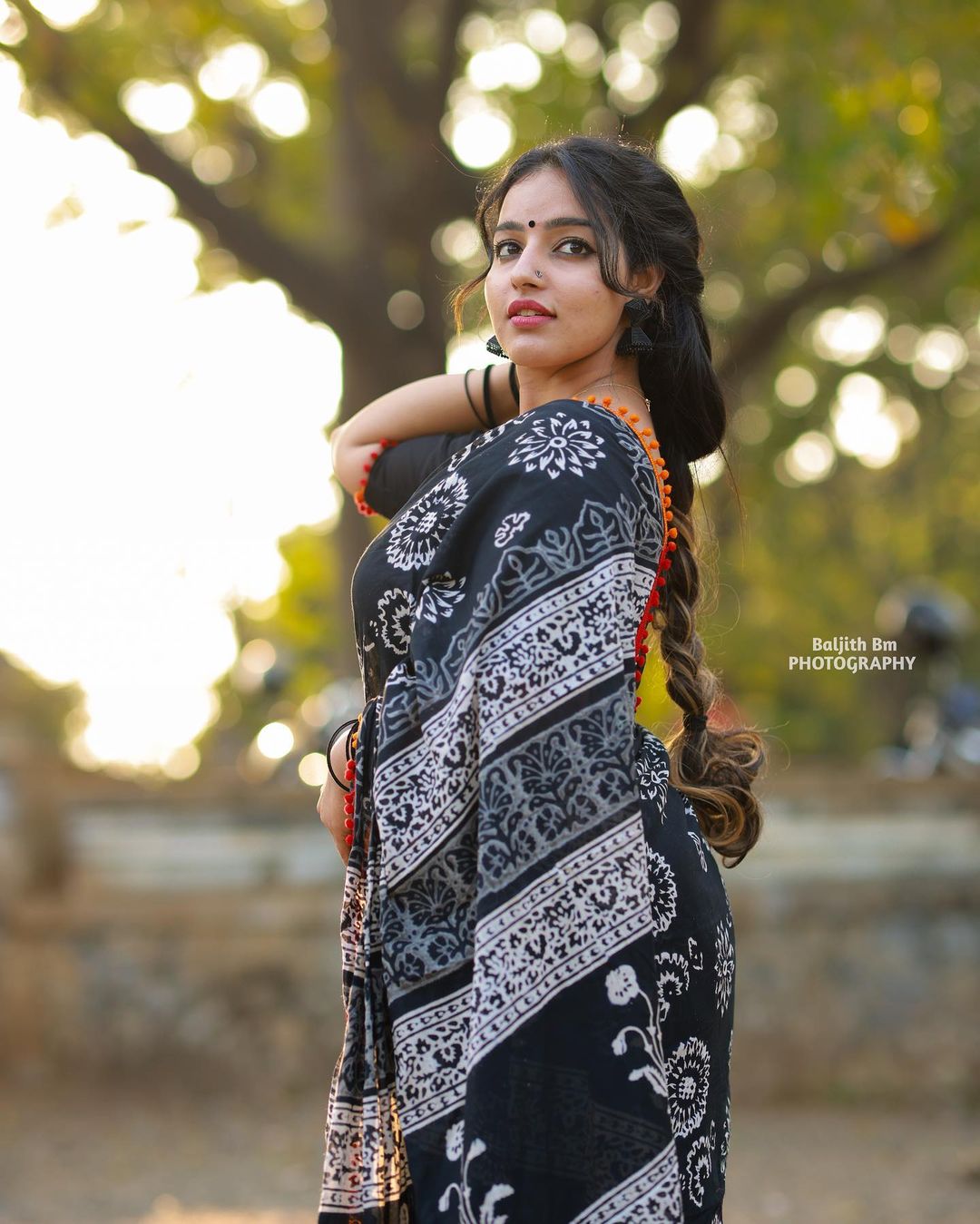 Stunning Malavika Menon in Black Saree Photos Fashion Gallery