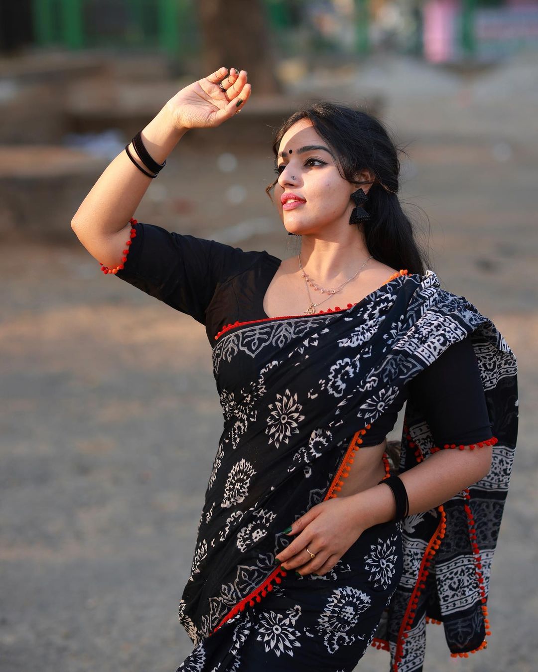 Stunning Malavika Menon in Black Saree Photos Fashion Gallery