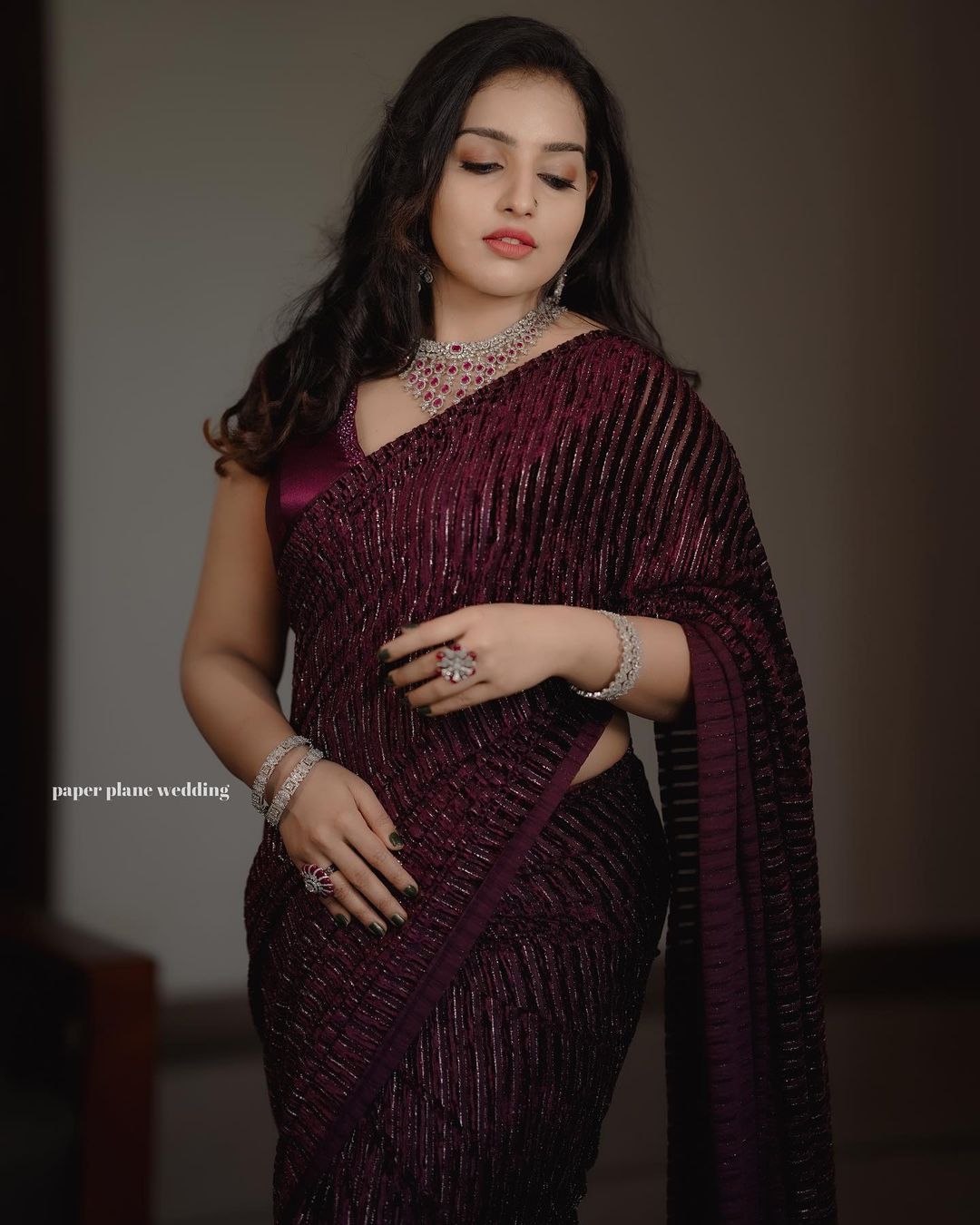 Stunning Malavika Menon Violet Saree Photos | Ethnic Elegance
