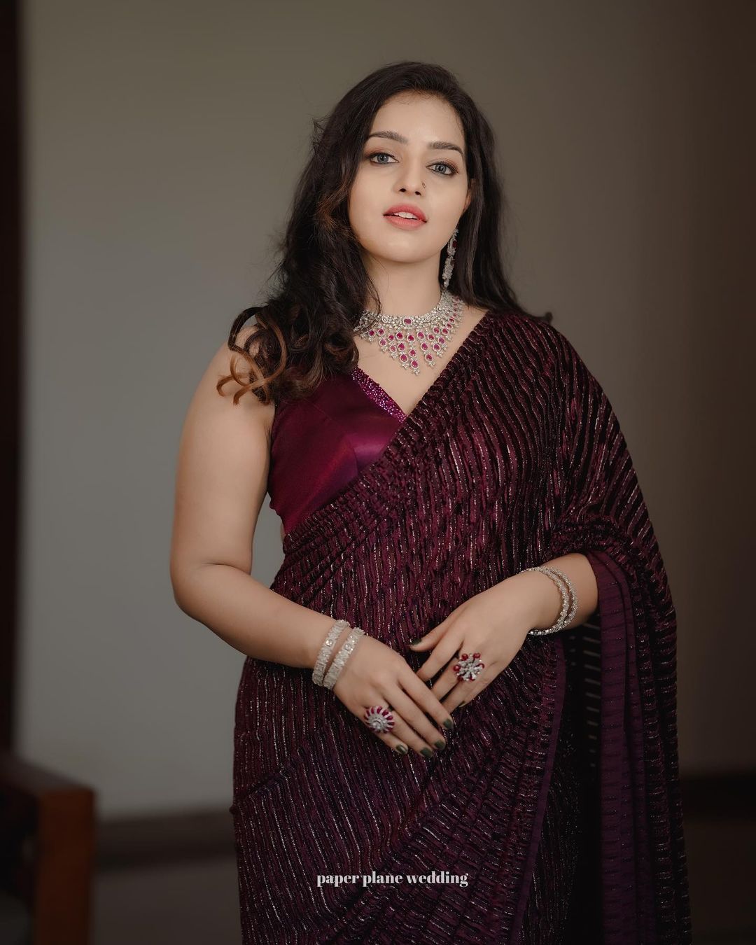 Stunning Malavika Menon Violet Saree Photos | Ethnic Elegance