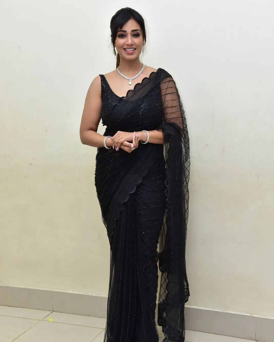 Stunning Nivetha Pethuraj in Black Saree Photos