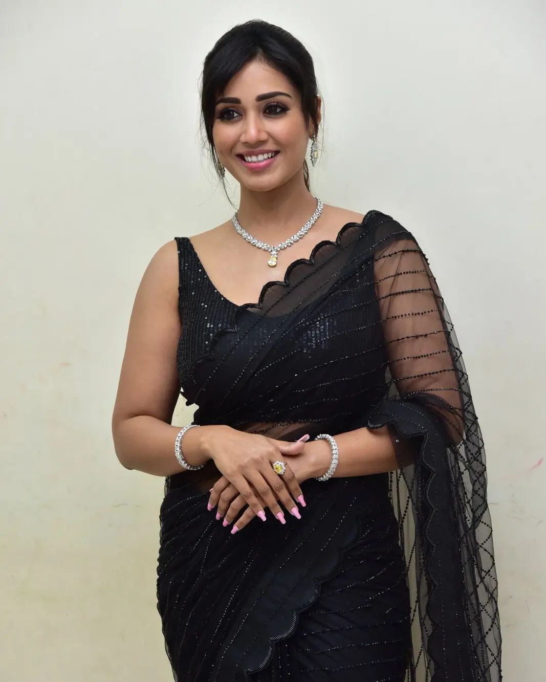 Stunning Nivetha Pethuraj in Black Saree Photos