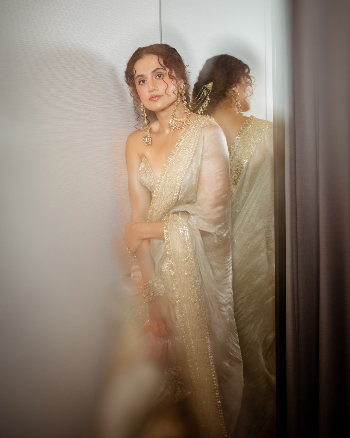 Ivory and Gold: Taapsee Pannu's Structured Sari Statement