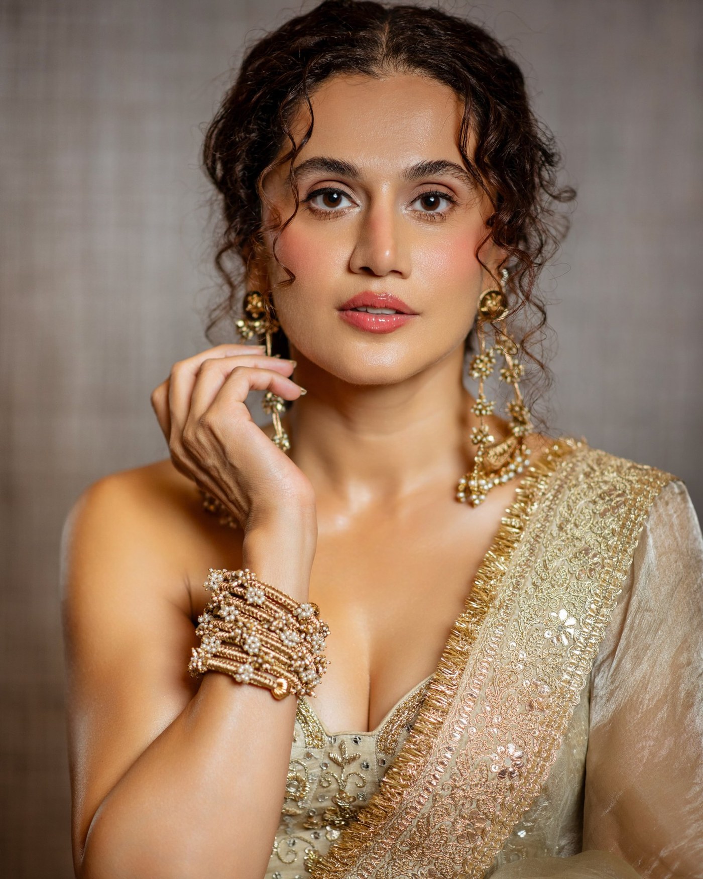 Ivory and Gold: Taapsee Pannu's Structured Sari Statement