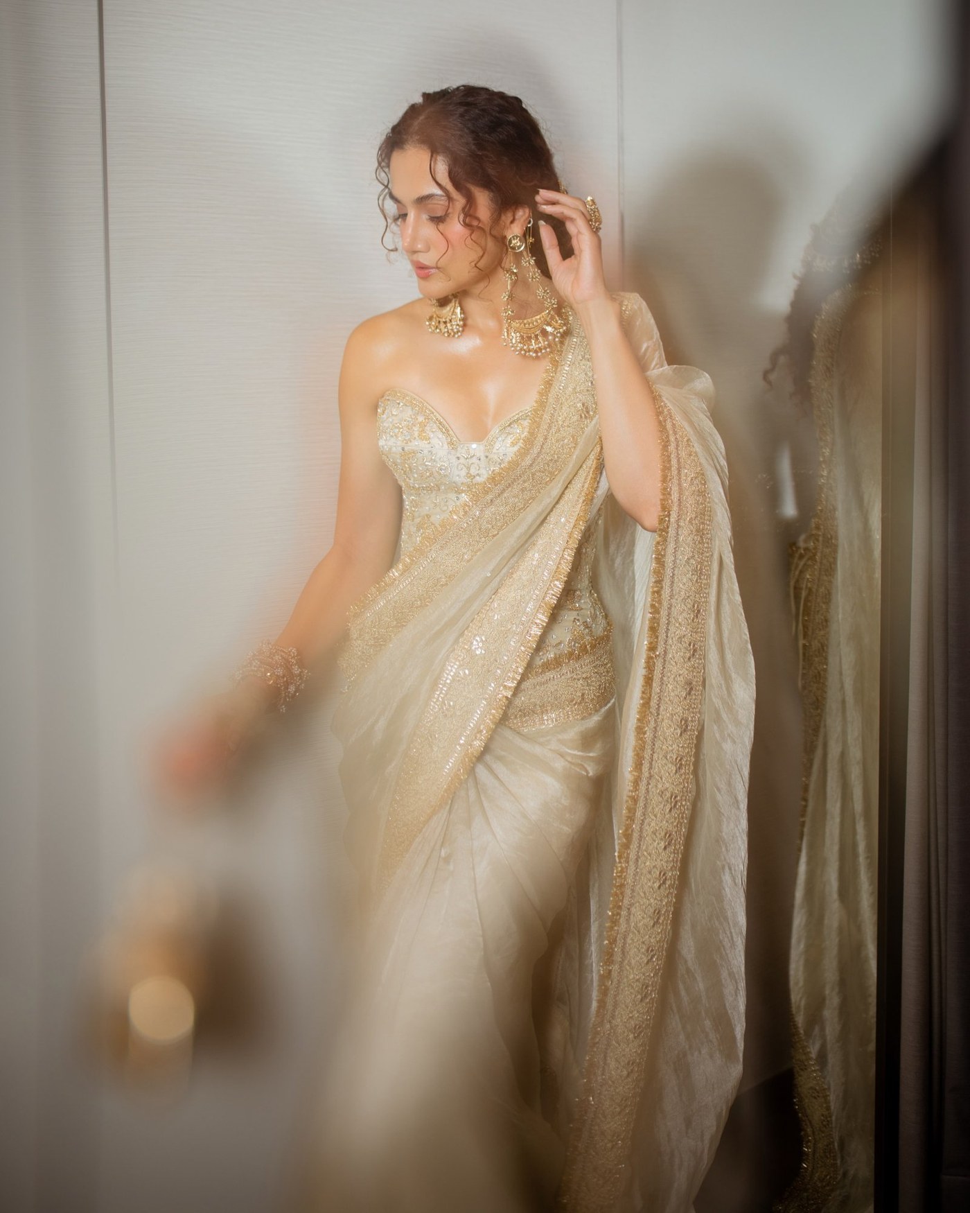 Ivory and Gold: Taapsee Pannu's Structured Sari Statement