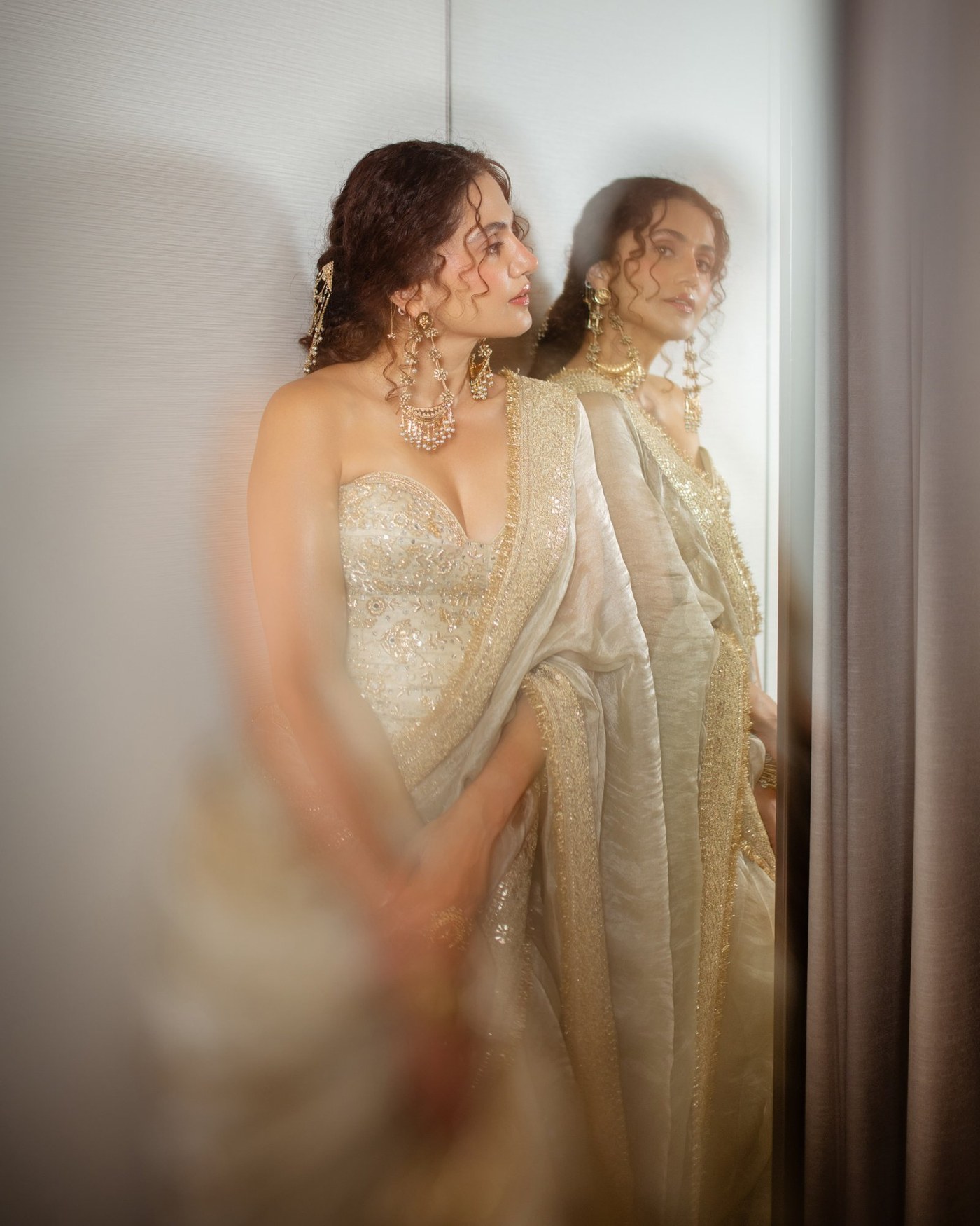 Ivory and Gold: Taapsee Pannu's Structured Sari Statement