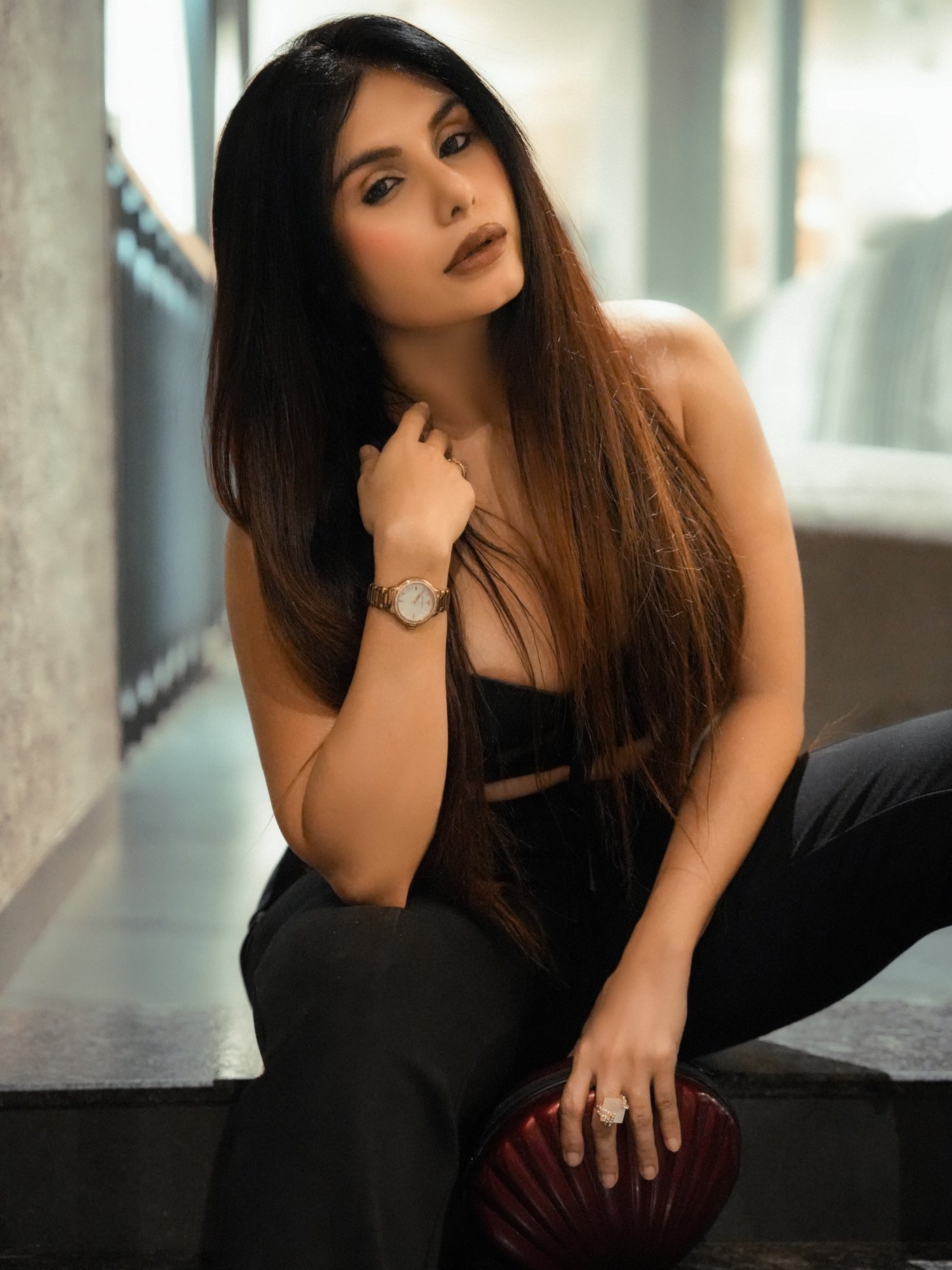 Taniya Chatterjee in a sleek all-black ensemble featuring structured top and tailored trousers. - Photos & Updates