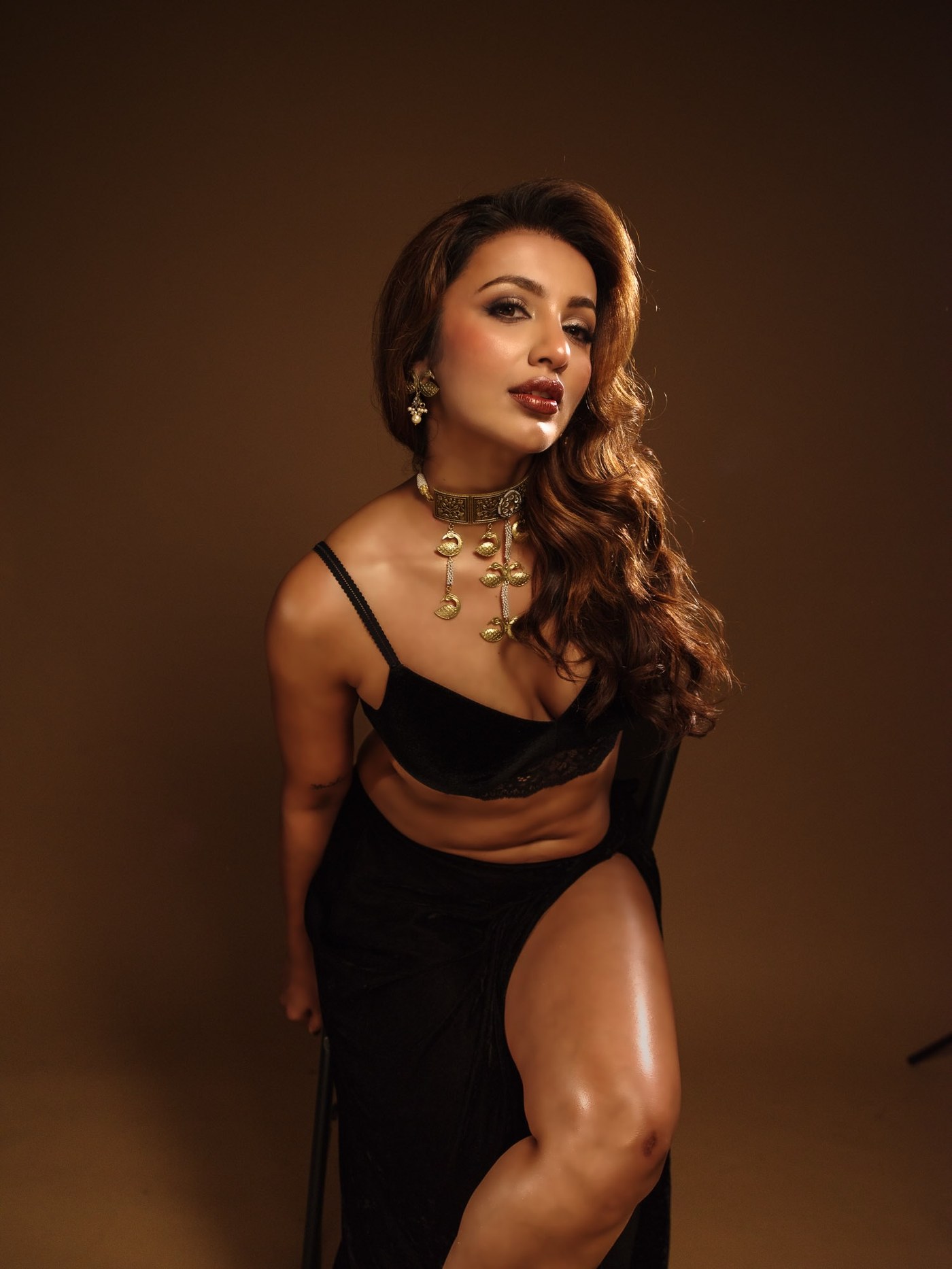Black-On-Black Glamour: Tejaswi Madivada’s Gold-Accented Silhouette