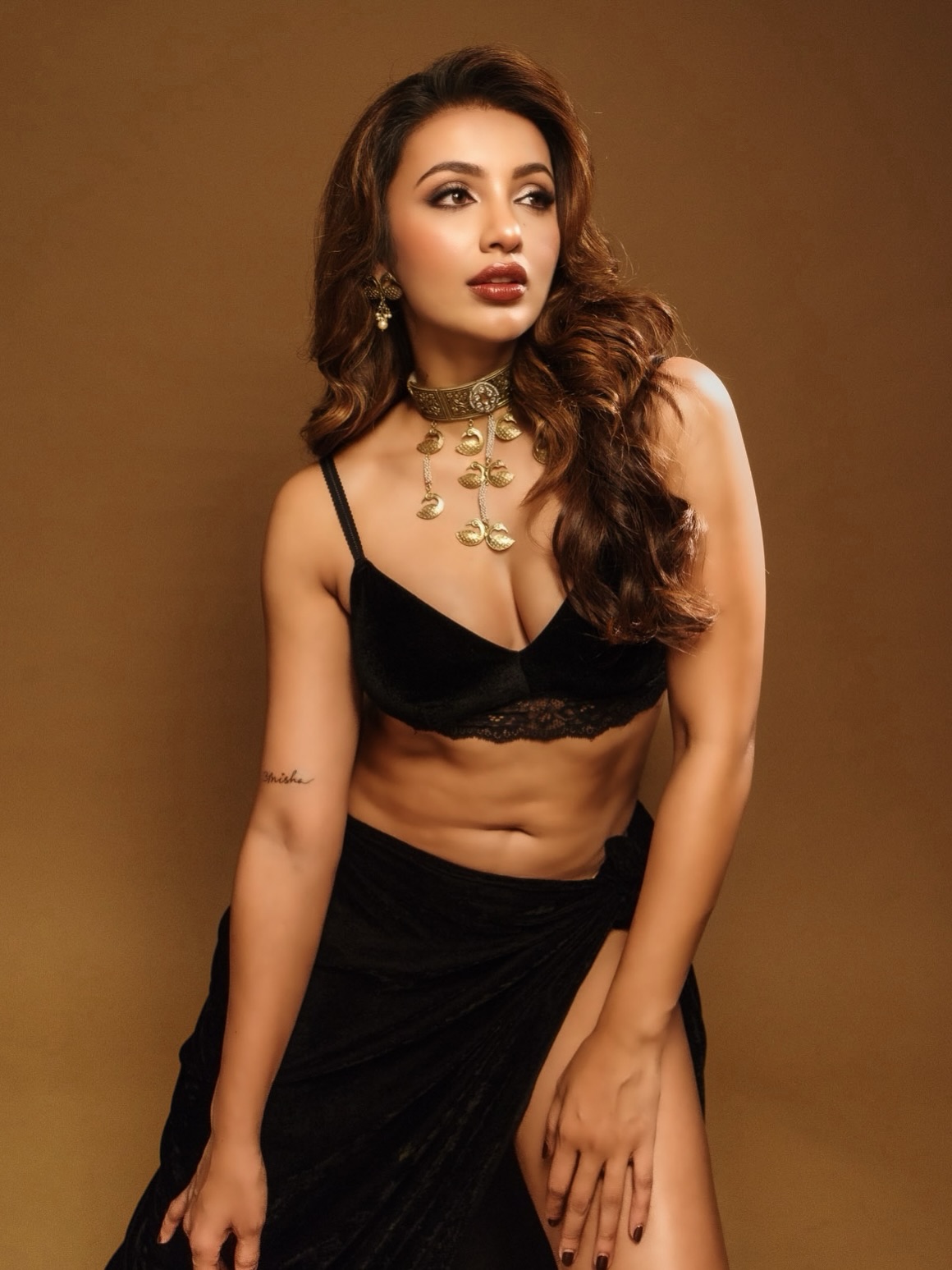 Black-On-Black Glamour: Tejaswi Madivada’s Gold-Accented Silhouette