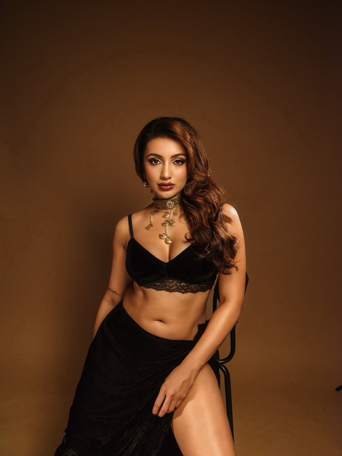 Black-On-Black Glamour: Tejaswi Madivada’s Gold-Accented Silhouette