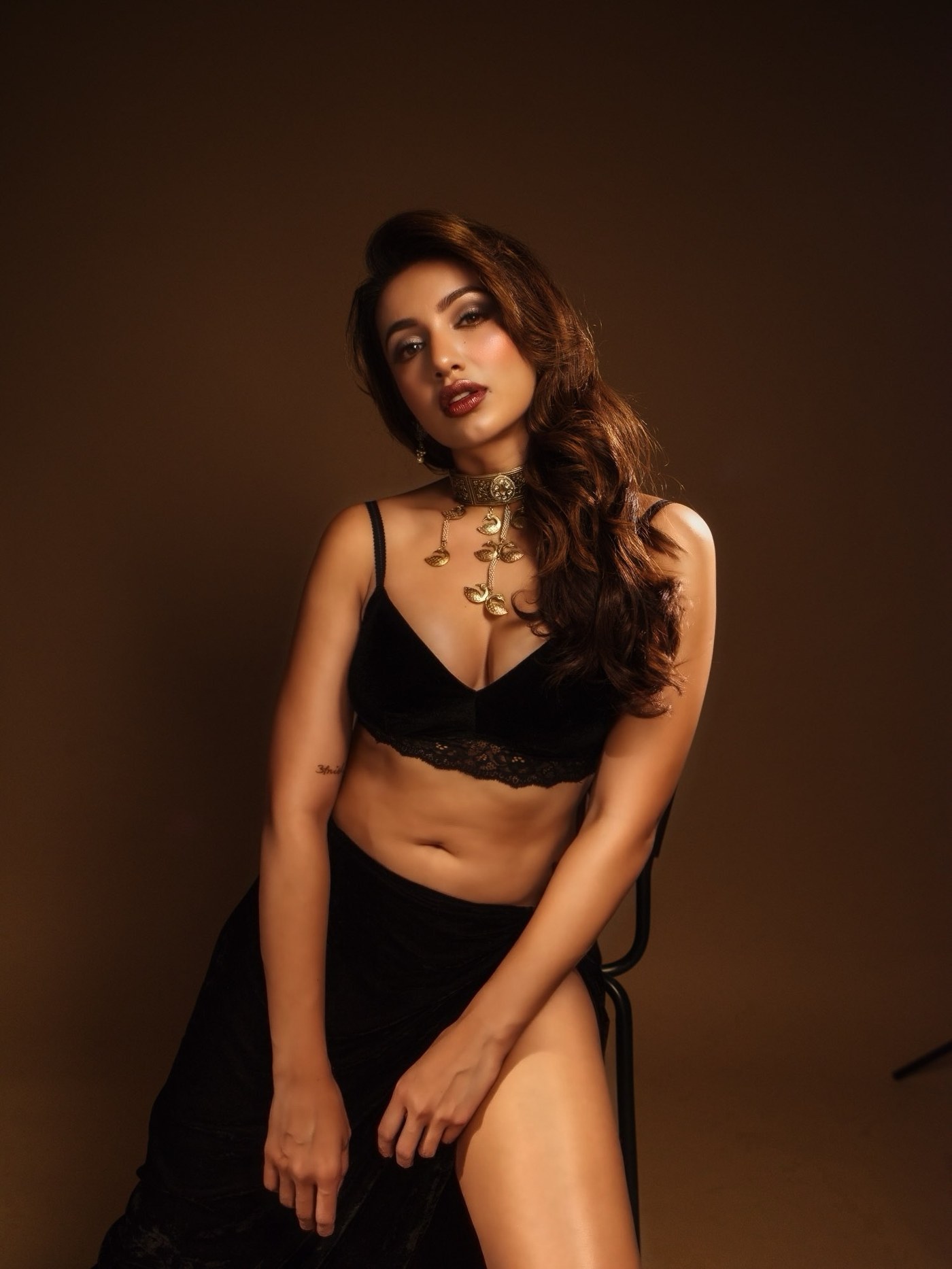 Black-On-Black Glamour: Tejaswi Madivada’s Gold-Accented Silhouette