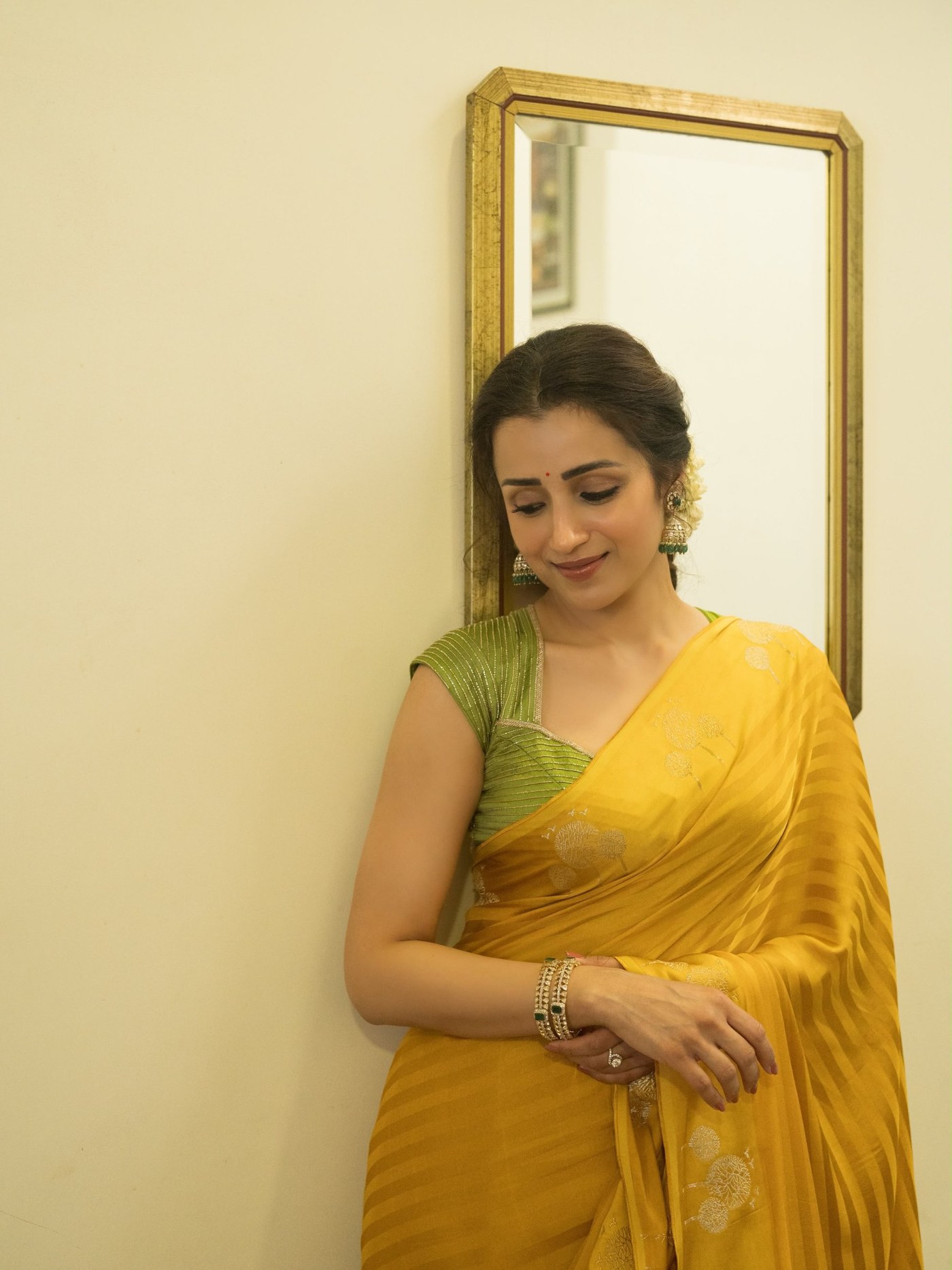 Trisha Krishnan's Yellow Saree Glow: A Timeless South Indian Aesthetic