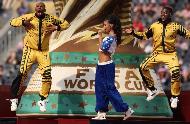 Tyla radiates confidence while performing on stage during a major international sporting event in Los Angeles.