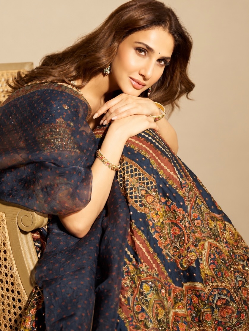 Vaani Kapoor wears a midnight blue lehenga with antique gold embroidery. - Photos & Updates