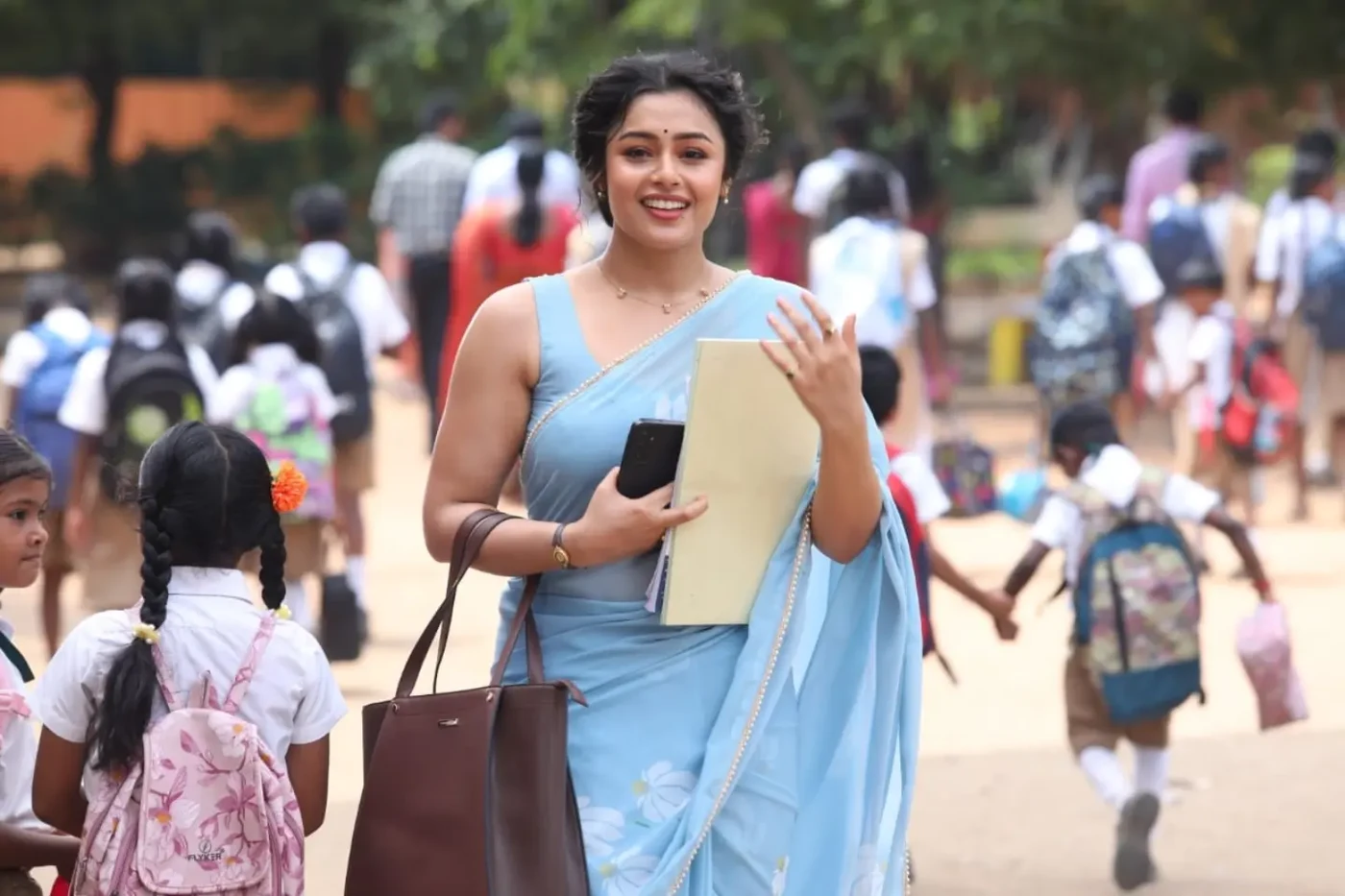 Mokksha Sengupta portraying Teacher Meenu Miss in Gatta Kusthi 2, captivating audiences with warmth and grace.