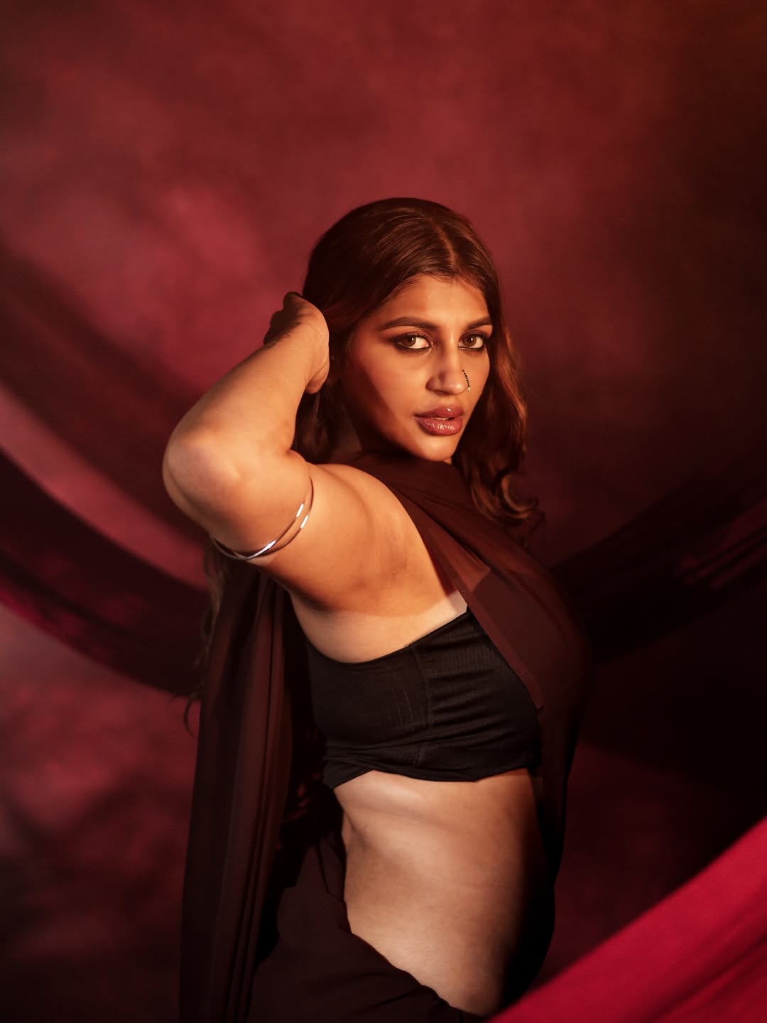 Yashika Aannand is seen radiating confidence and glamour in a stylish sleeveless ensemble.
